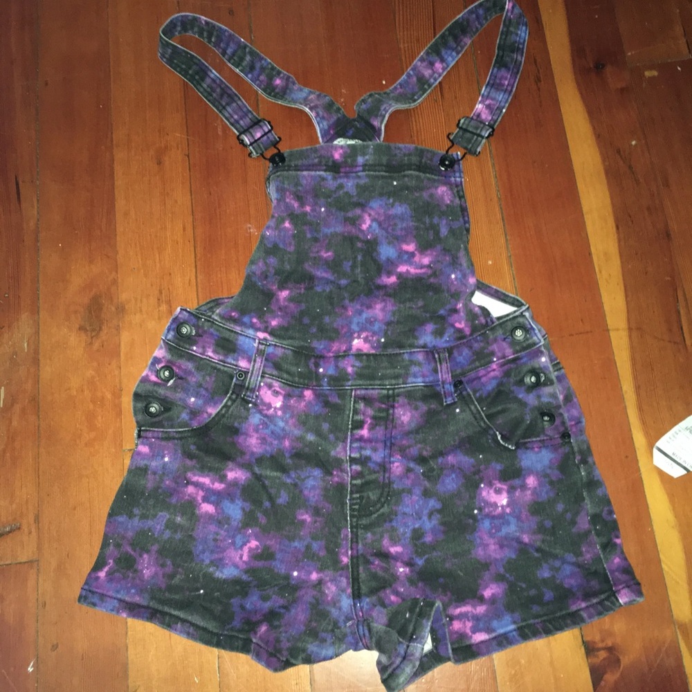 Galaxy romper short overalls size SM a little faded but still in good condition